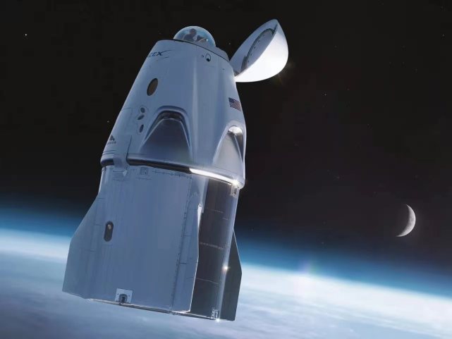 图注：SpaceX计划用载人龙飞船把四名太空游客送到540公里高的地球轨道，在轨道上运行3天（艺术图）。